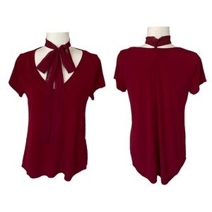 Do Not Disturb Blouse Women’s size M Red Necktie V neck High Low Short Sleeve